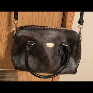 Brown and black Coach crossbody purse
